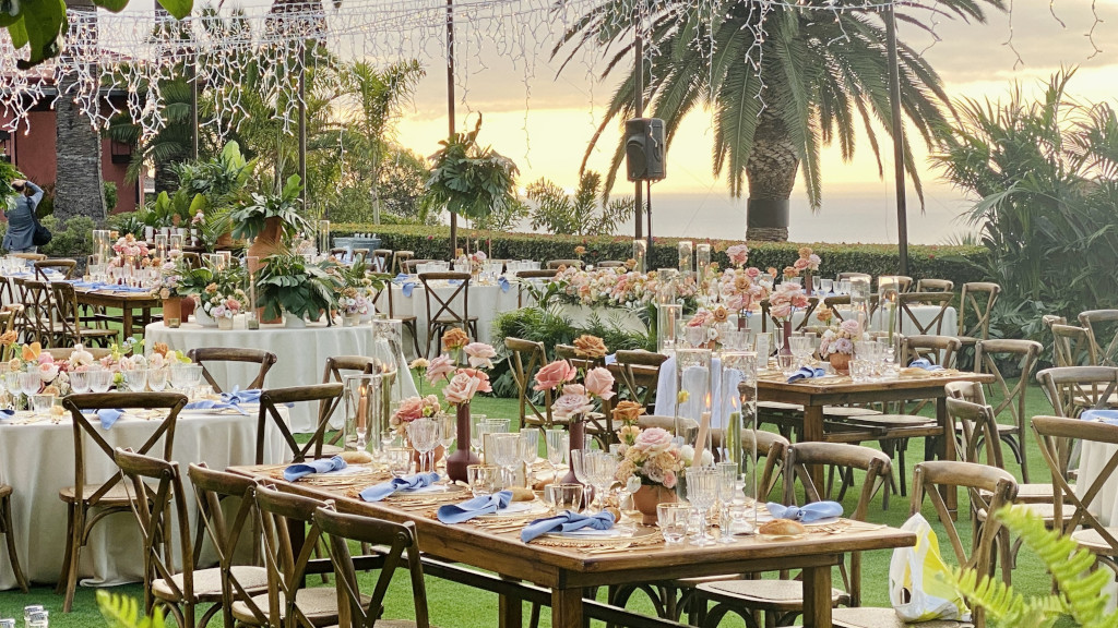 Tables decorated for outdoor weddings at sunset in Tenerife.