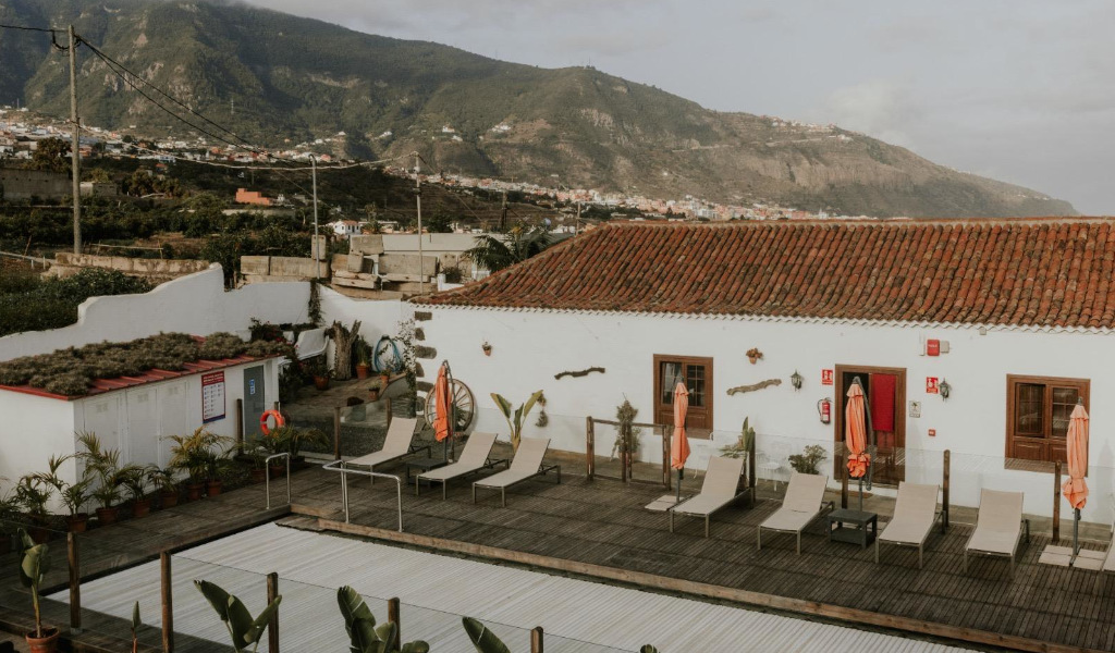 Terrace with sun loungers and mountain in the background in Tenerife.