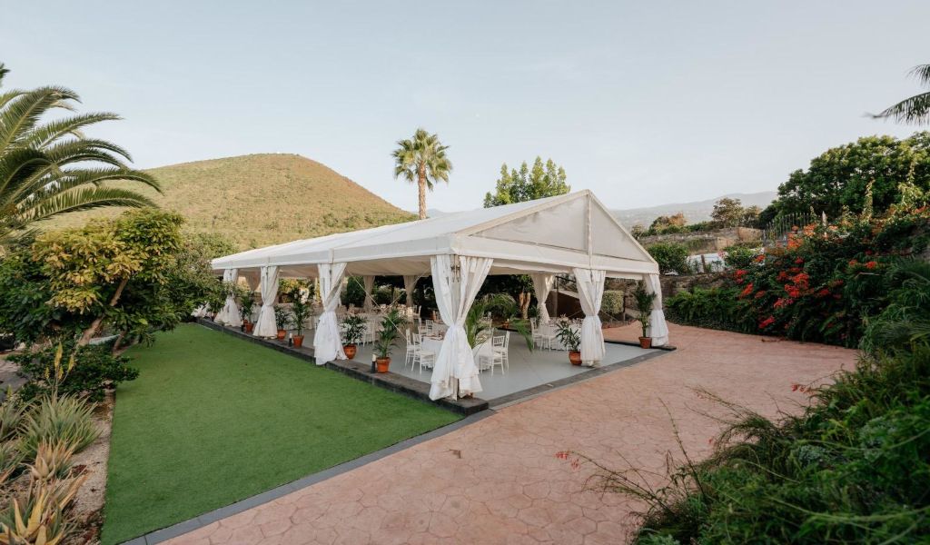 White tent in garden with vegetation in Tenerife.