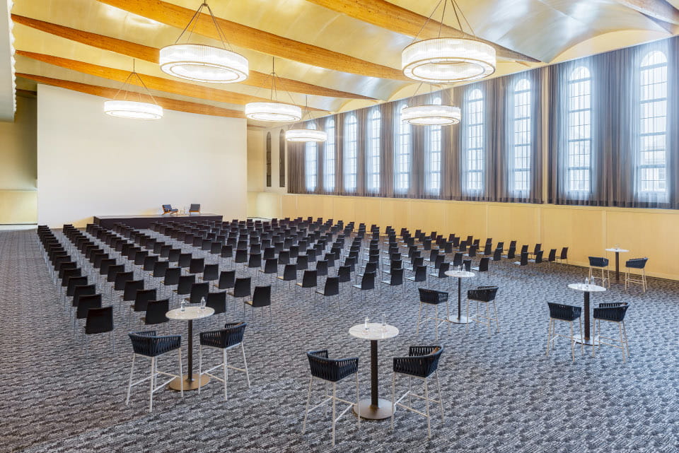 Large conference room with rows of chairs and tables in a modern space in Tenerife.