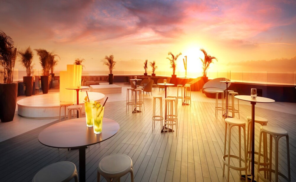 Sunset terrace with tables and chairs in Tenerife.