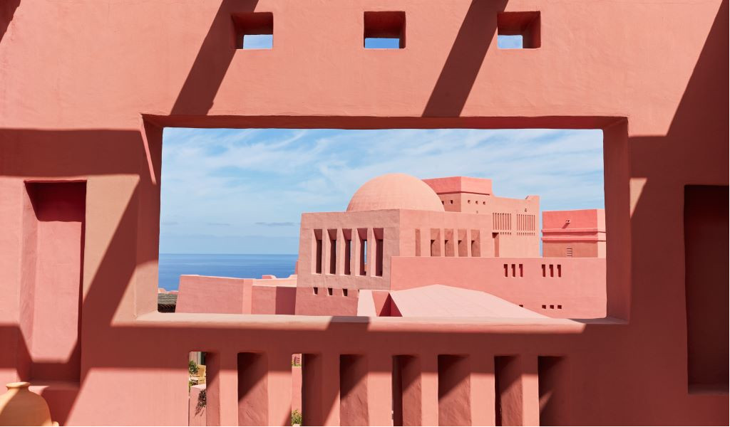 Pink architecture building with sea views in Tenerife.