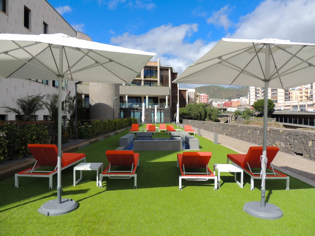 Terrace with sun loungers and parasols in Santa Cruz de Tenerife.