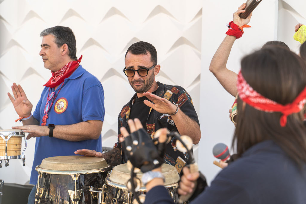 People playing drums at an outdoor event in Tenerife.