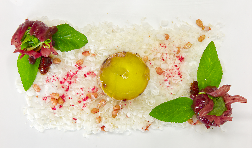 Gourmet dish with red meat, green leaves and sauce in Tenerife.