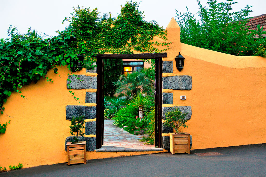 Entrance with plants and stone wall in Puerto de la Cruz, Tenerife.