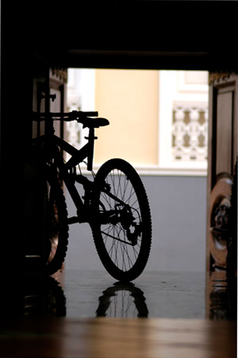 Bicycle silhouette inside a hallway in Tenerife.