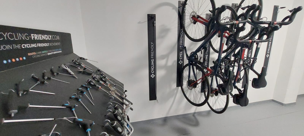 Tools and bikes on a Cycling Friendly wall in Tenerife workshop.
