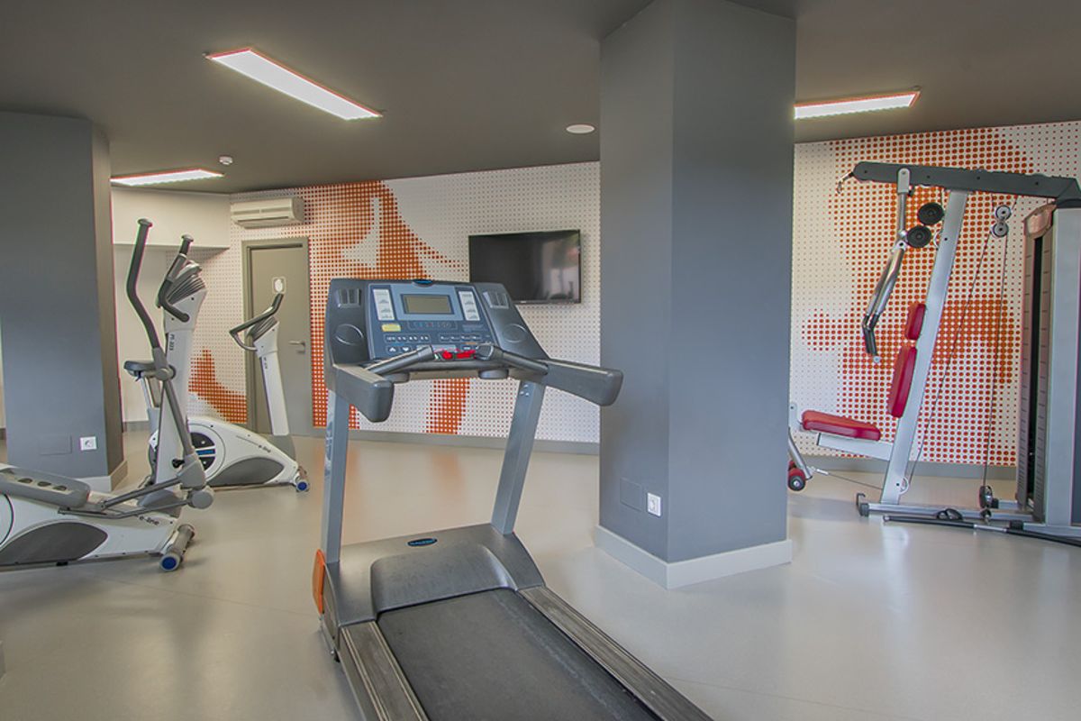 Treadmill and exercise machines in a gym in Tenerife.