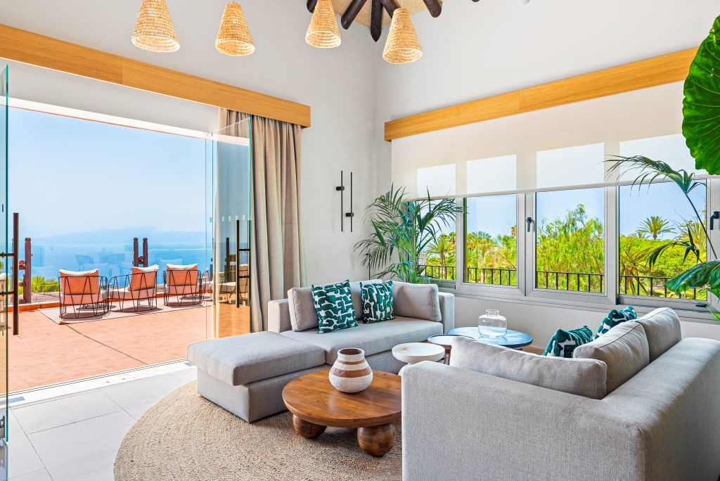 Spacious living room with ocean views and terrace in Tenerife.