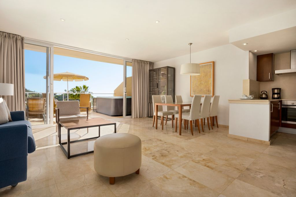 Dining and living area with terrace view in Tenerife.