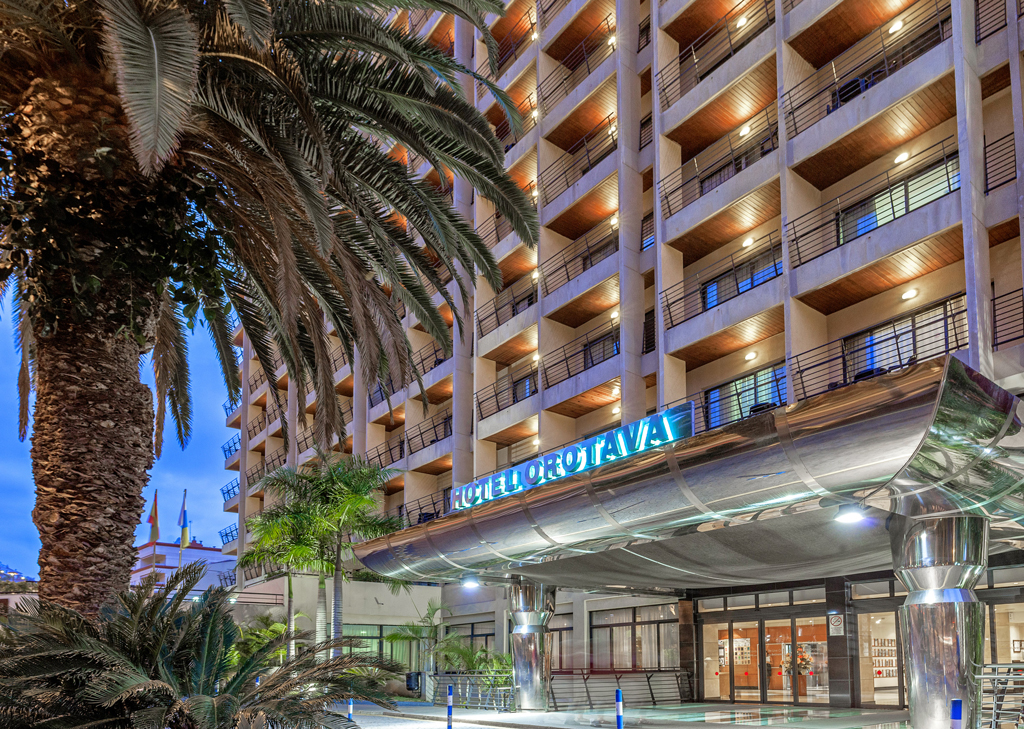 Hotel Orotava entrance with palm trees, located in Tenerife.
