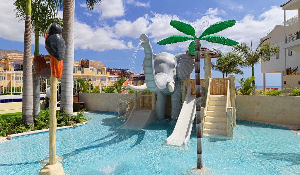 Children's water slide with elephant theme at a pool in Tenerife.