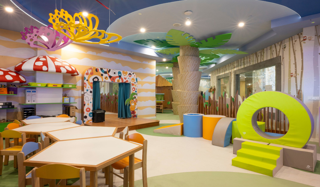 Playroom with colorful furniture and mushroom decorations in Tenerife.