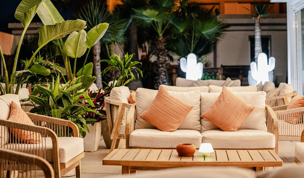 Outdoor seating with cushions and plants at a terrace in Tenerife.