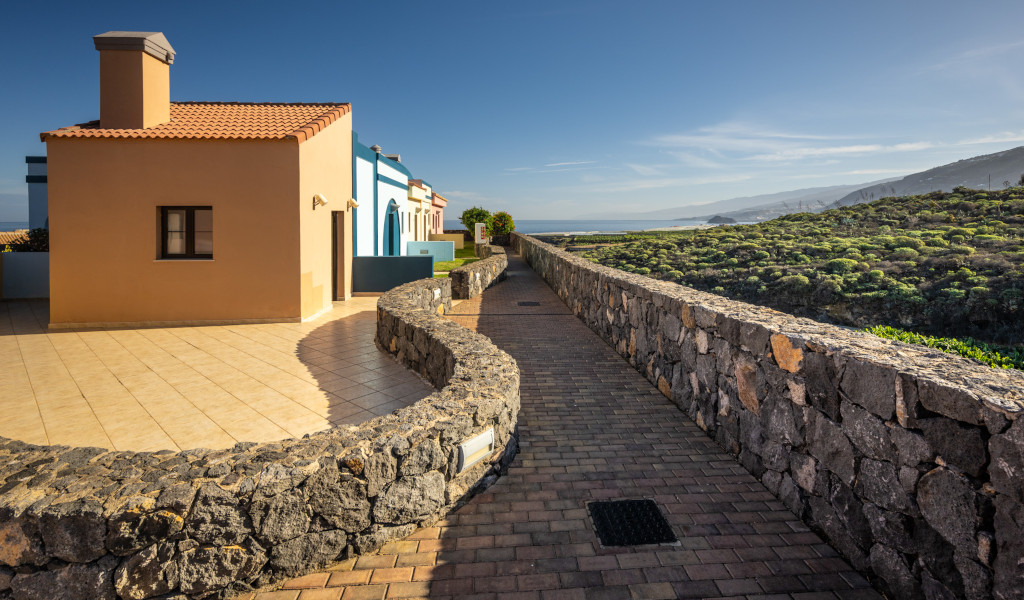 House with tiled roof and stone path near the coast of Tenerife.