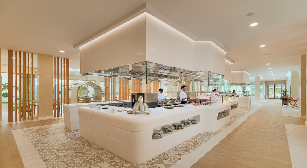 Chefs working in open kitchen at a restaurant in Tenerife.