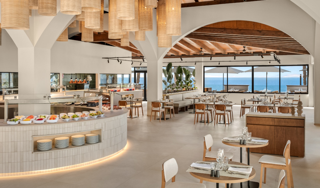 Restaurant dining area with buffet and ocean view in Tenerife.