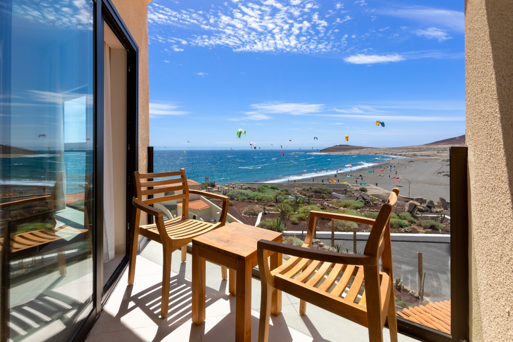 Balcony view of kite surfers at El Medano beach in Tenerife.