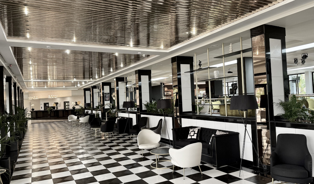 Modern hall with checkered floor and black and white furniture in Tenerife.