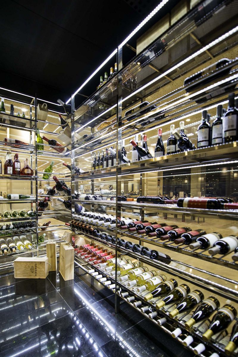 Shelves filled with wine bottles in a Tenerife restaurant.