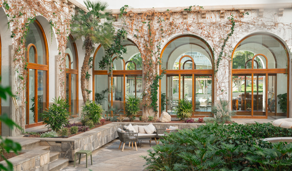 Courtyard with arches and plants in a Tenerife location.