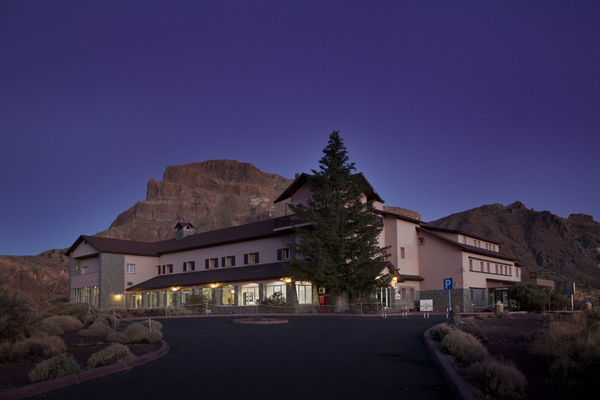 Building at dusk with mountains in the background at Teide National Park, Tenerife.