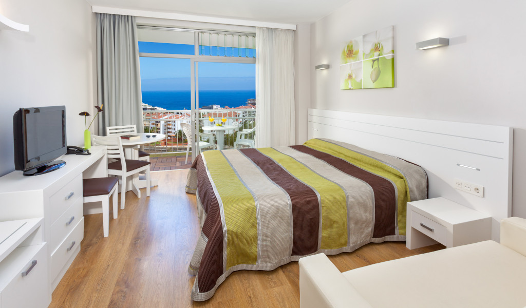 Hotel room with ocean view and balcony in Tenerife.