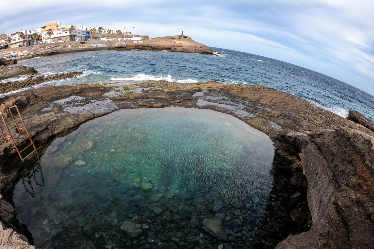 Natural pool, rocky shore, and ocean view at Tajao, Tenerife.