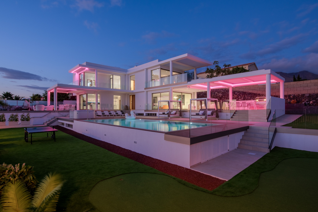 Luxury villa with pool and pink lighting, Costa Adeje, Tenerife.