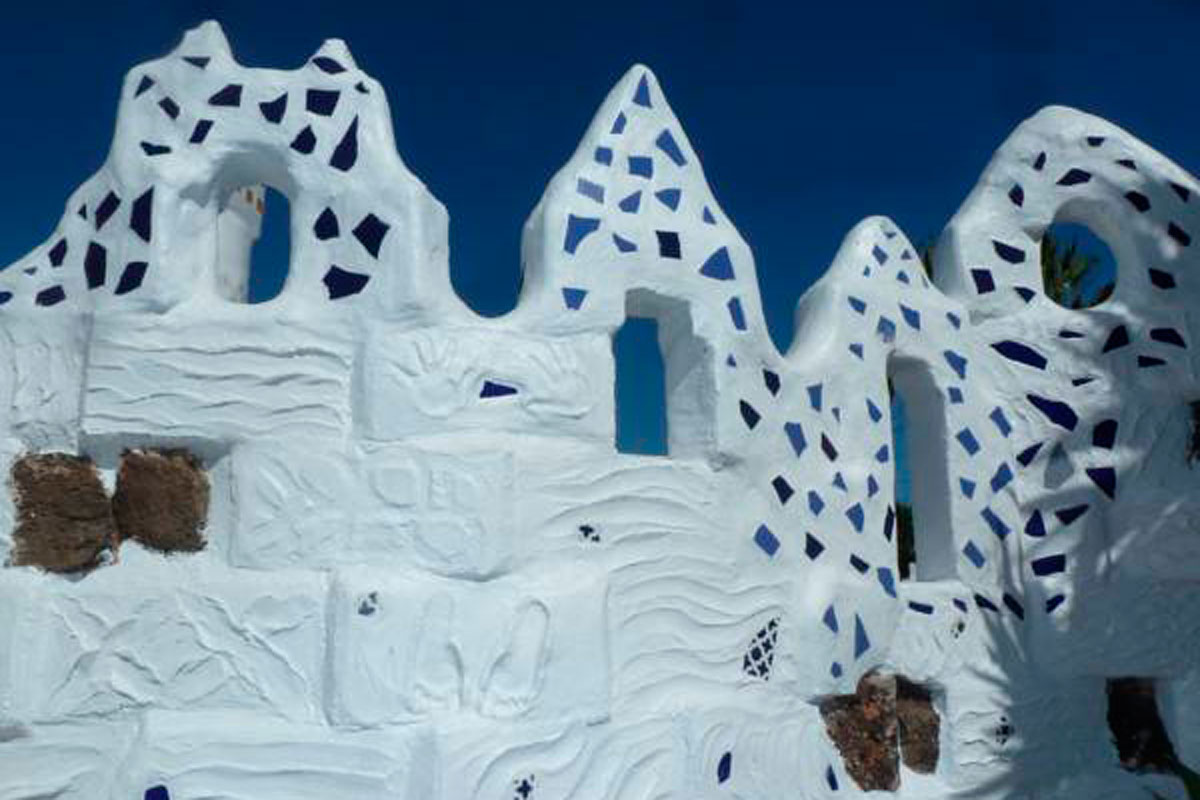 White mosaic structure with blue tile accents in Tenerife.