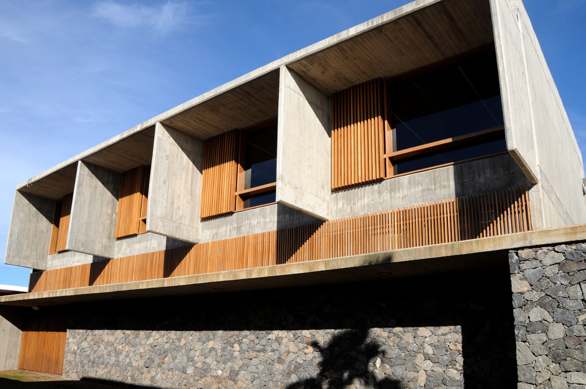 Modern building with concrete and wood façade in Tenerife.