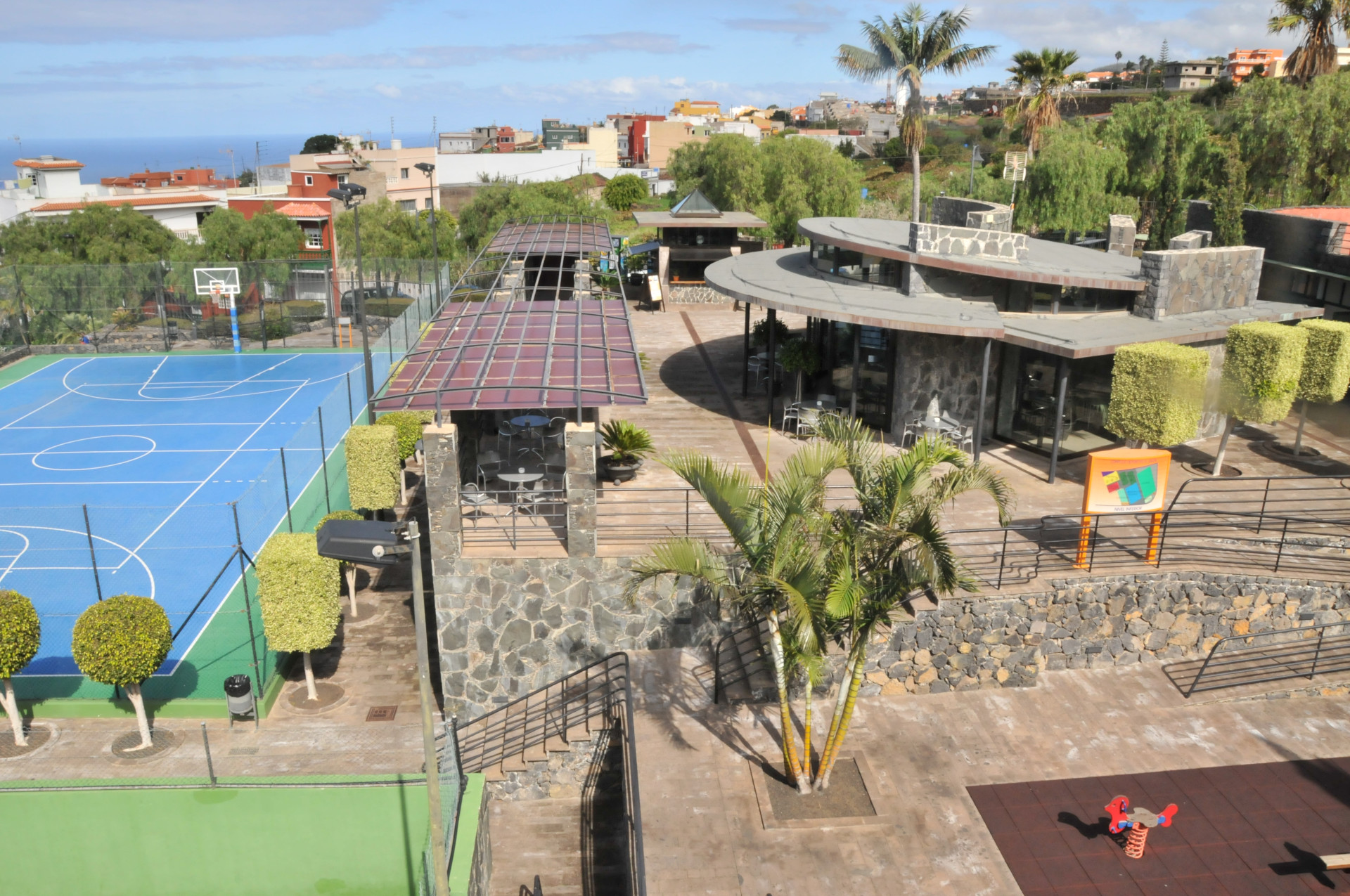 Sports centre with basketball court and buildings in La Laguna, Tenerife.