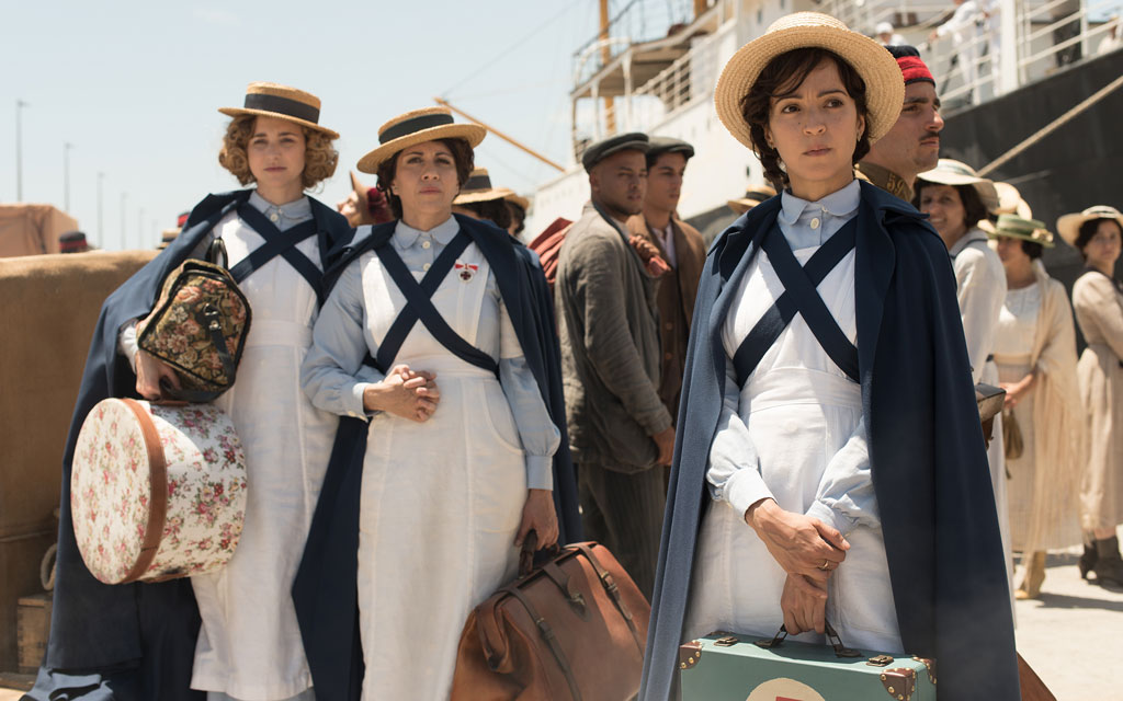 Women dressed as nurses waiting in a port in Tenerife.