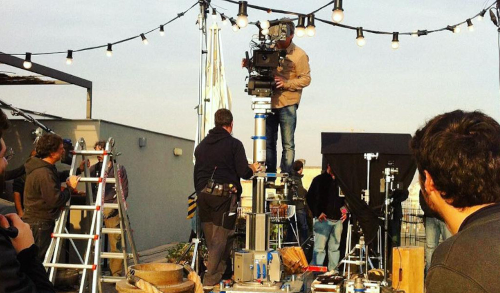 Film crew preparing a scene on an outdoor set in Tenerife.