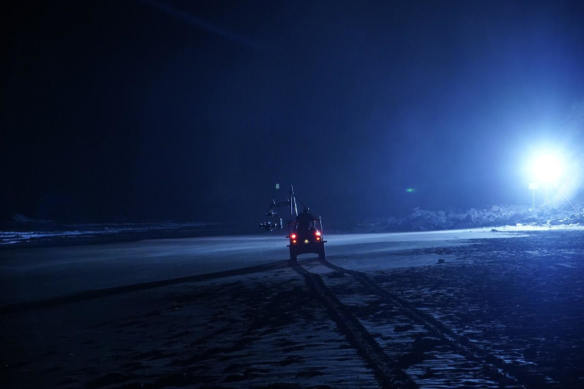 Small vehicle on the beach lit up at night in Tenerife.