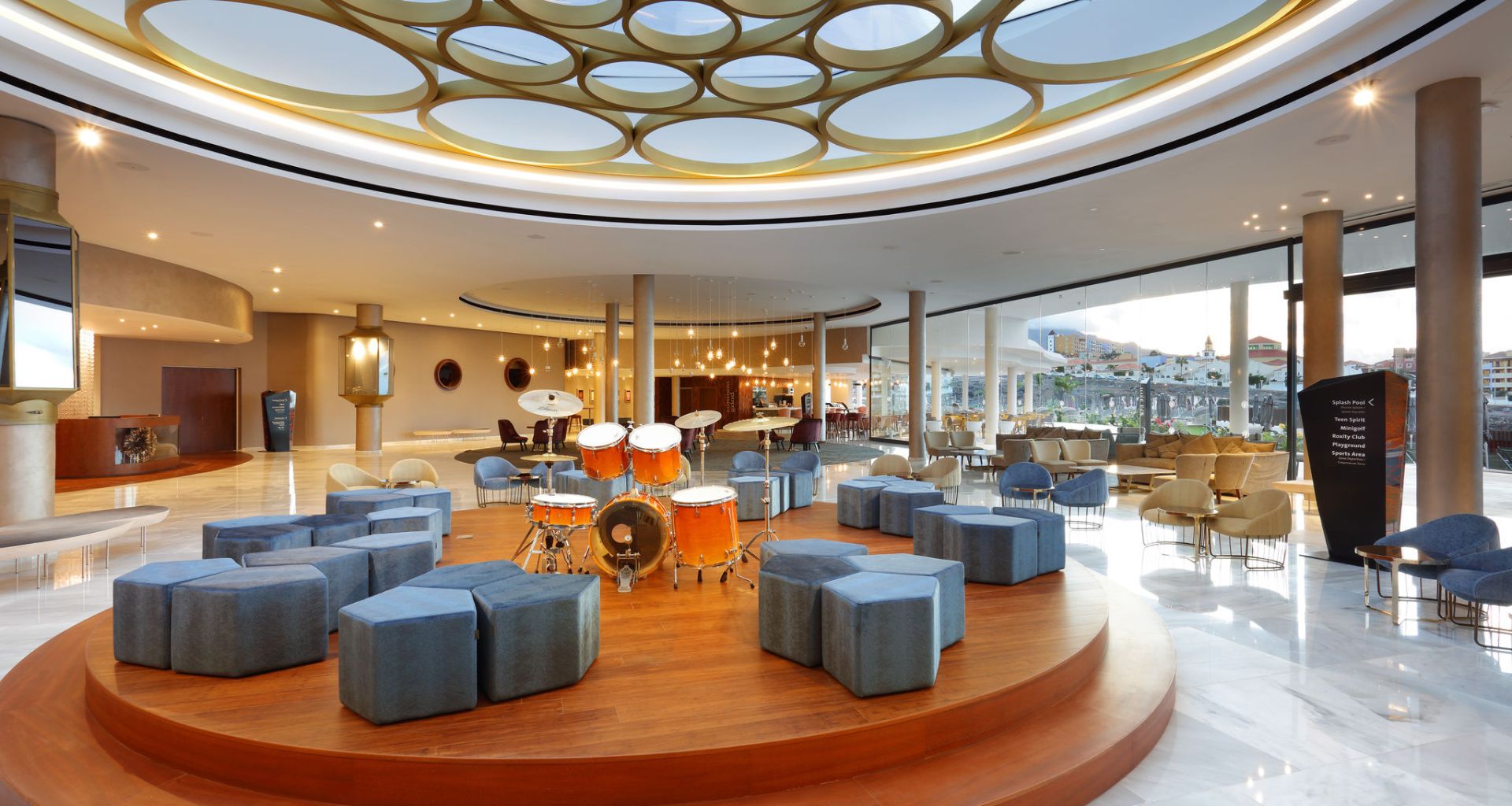 Hotel lobby in Tenerife with circular platform battery and modern ceilings.