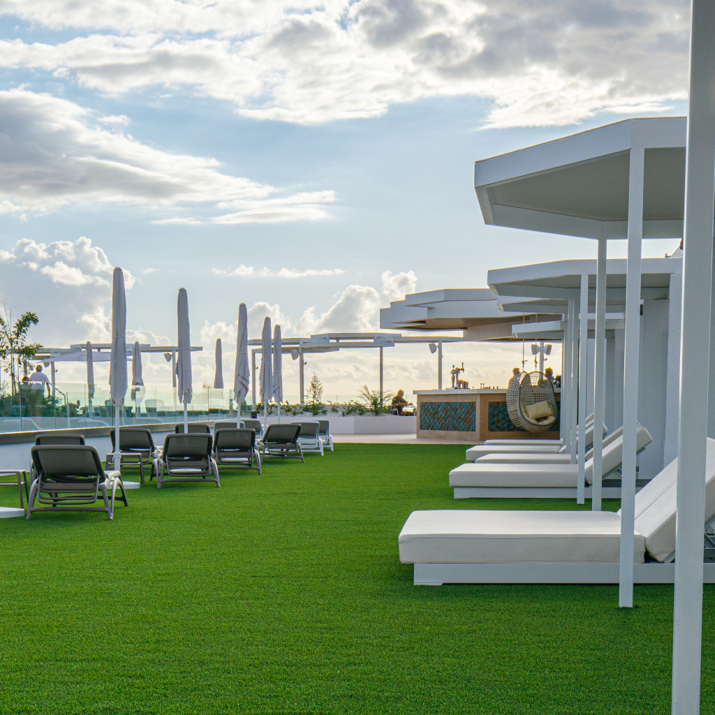 Terrace with sun loungers and parasols in a hotel in Tenerife.