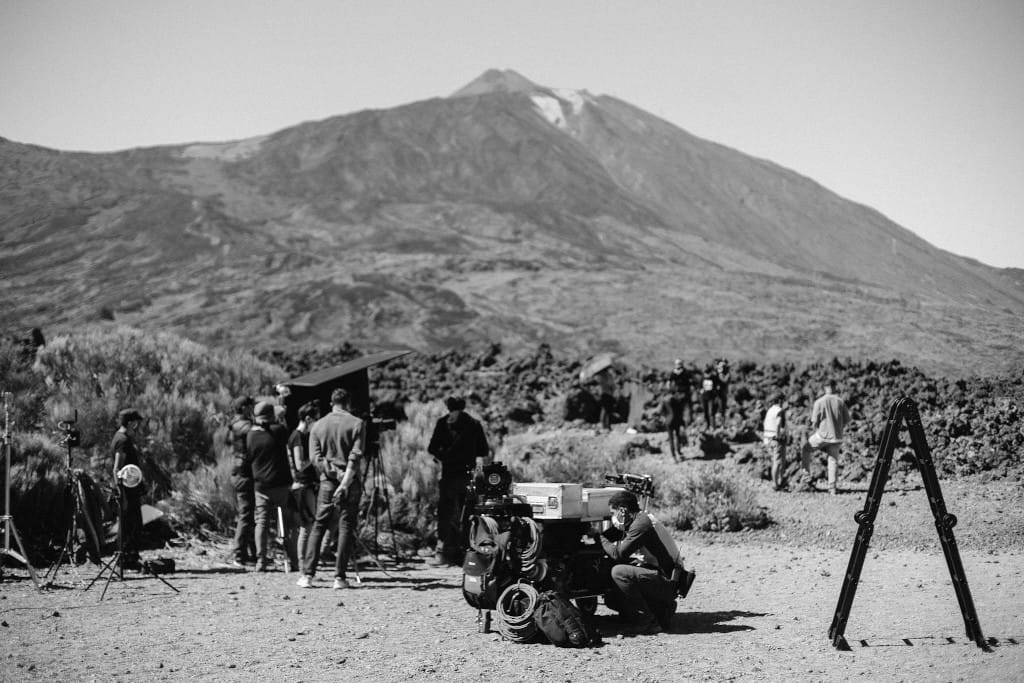 Film crew in the Teide National Park, with the volcano in the background.