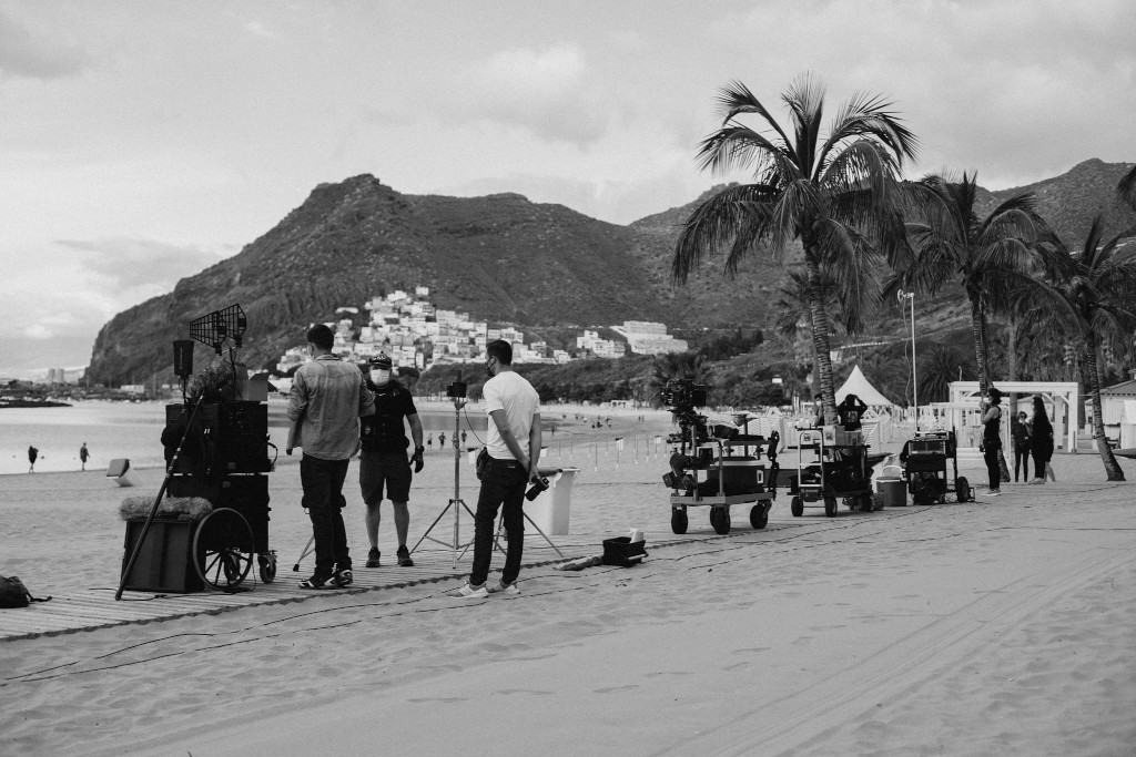 Filming on the beach of Las Teresitas, Tenerife, with film crew and staff.