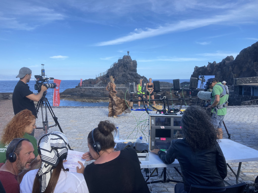 Recording of production equipment in Tenerife, by the sea and rock formations.