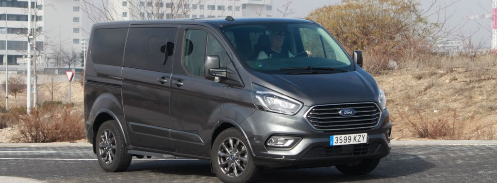 Grey Ford van driving on a road in Tenerife.