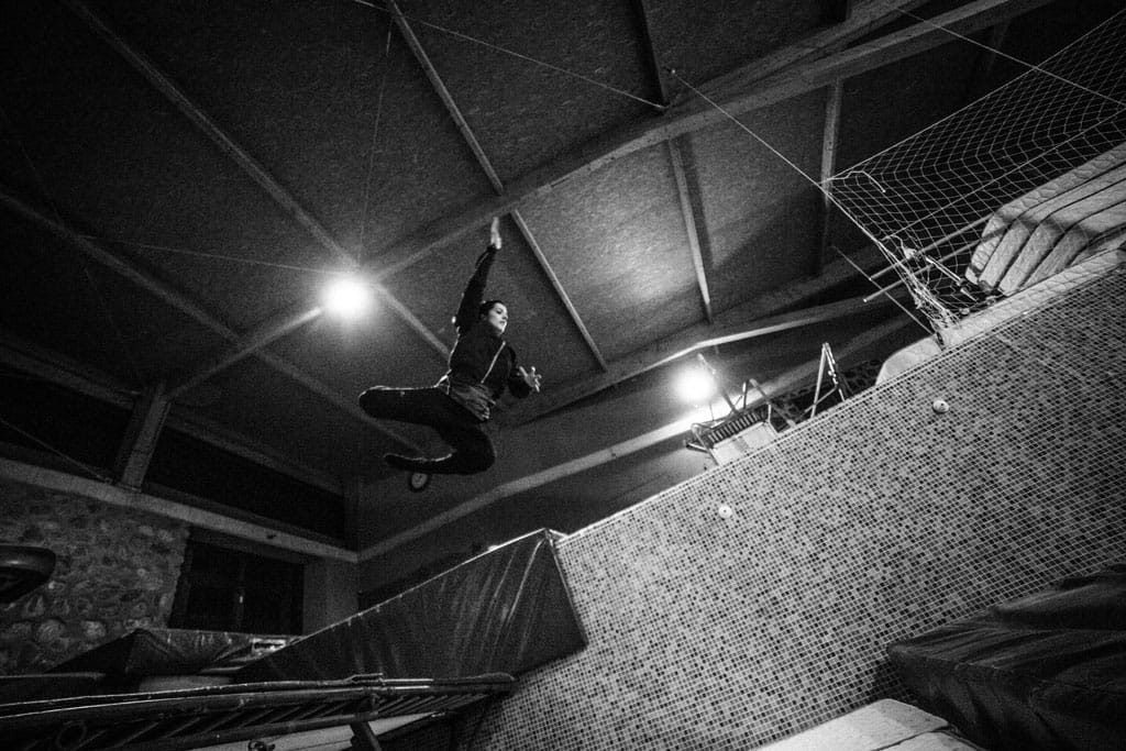 Person jumping on a trampoline inside an indoor structure in Tenerife.