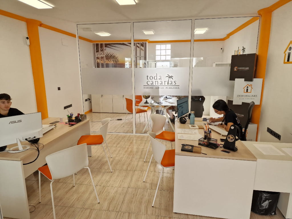 Modern Todacanarias office in Tenerife with staff working.