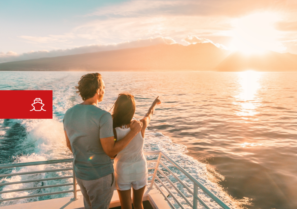 Couple enjoying the sunset from a boat in Tenerife.