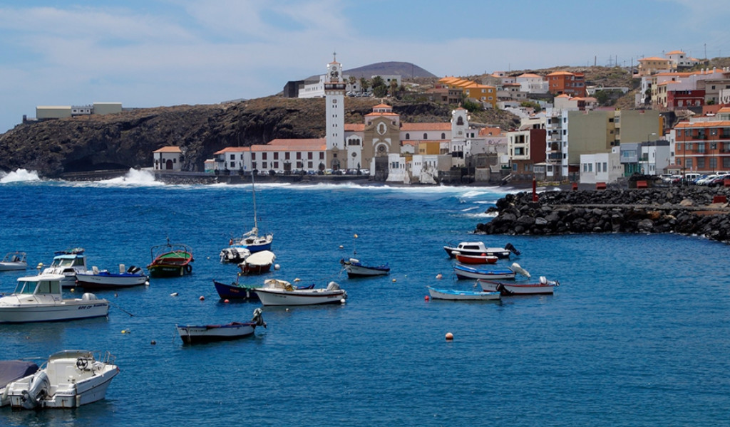 Port with boats in front of the Basilica of Candelaria, Tenerife.