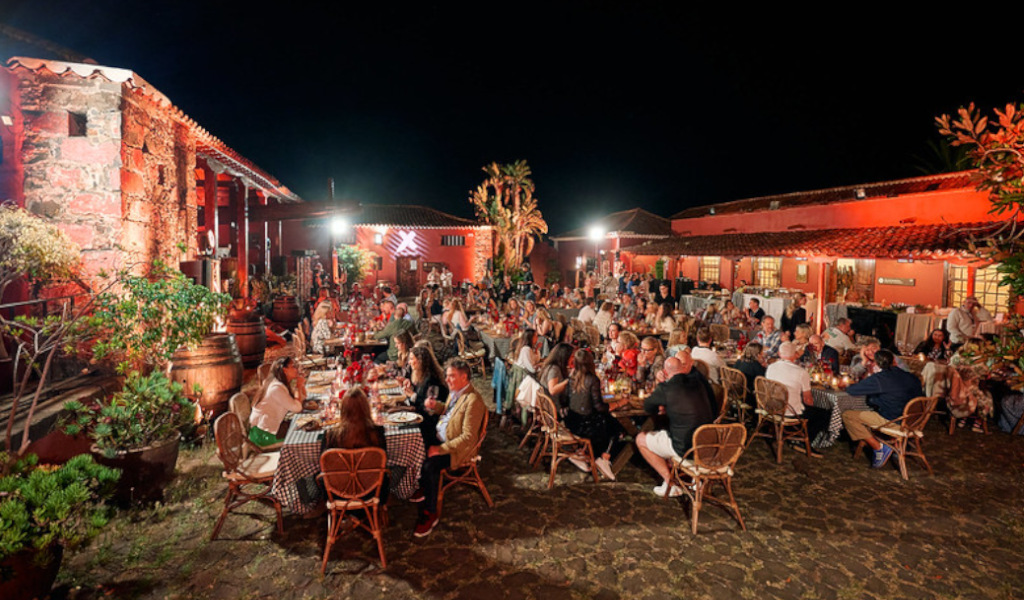 People dining outdoors at a finca in Tenerife during the night.