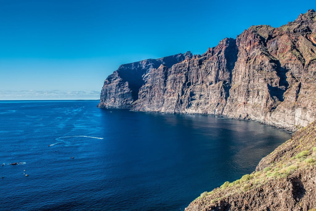 Los Gigantes cliffs in Tenerife next to the blue ocean.