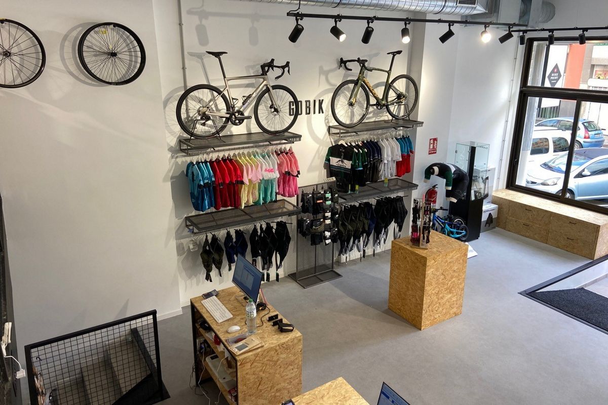 Bike shop in Tenerife with cycling clothing and bikes on display.