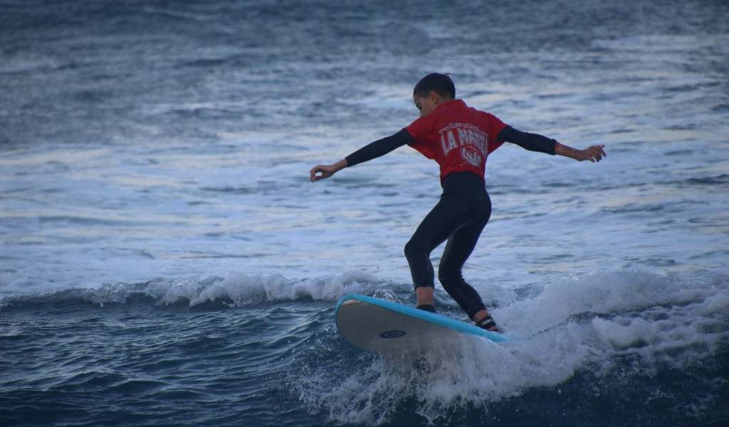 Surfer in action on a wave at La Marea, Tenerife.